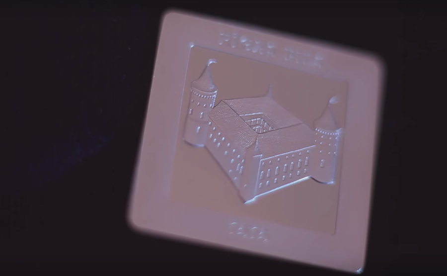 Video: Latvijas sudraba kolekcijas 5 eiro monēta 'Rīgas pilij 500'.